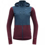 Dámska softshellová bunda Devold Herøy Hybrid Merino Jkt Wmn červená/modrá Beetroot/Flood